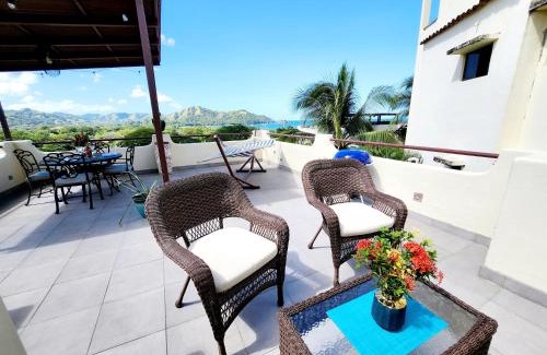 Coco Sunset Hills Apartment | Amazing Oceanview rooftop terrace walk to beach