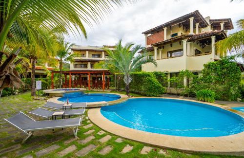 Coco Sunset Hills Apartment | Amazing Oceanview rooftop terrace walk to beach