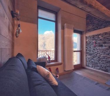 Ostana Apartment | AMELU' LOCAZIONI TURISTICHE