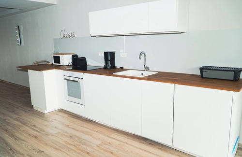 Rettin Apartment | Anchorage - stylish apartment with sea view & balcony
