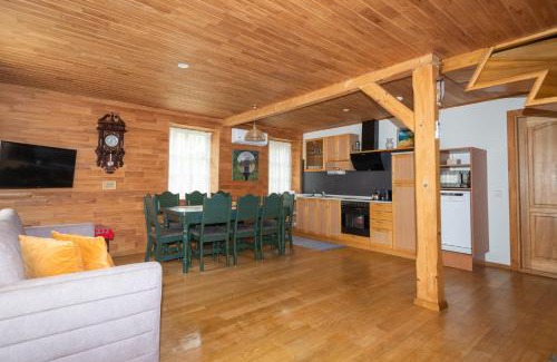 Nida Apartment | Apartamentas 'Jūratė' 6-8 asmenims su sauna, privačiu kiemeliu prie jachtklubo.