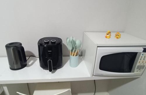 Avenida Apartment | Apartamento térreo aconchegante com estacionamento na porta