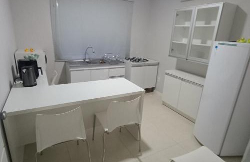 Avenida Apartment | Apartamento térreo aconchegante com estacionamento na porta