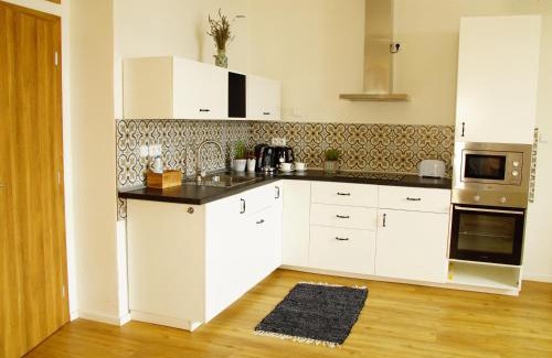 Terezin Apartment | Apartmány u komína