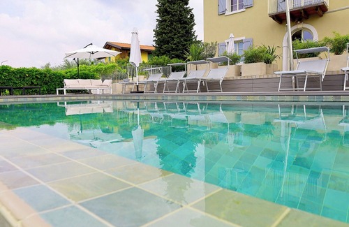 Affi Apartment | Apartment 'Biancaleo Kiss The Sky' with Shared Pool, Shared Garden and Wi-Fi