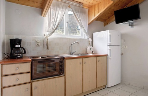 Limni Keri Apartment | Apartment "Dolphin Apartment Sea View 9" with Private Balcony, Shared Garden & Wi-Fi