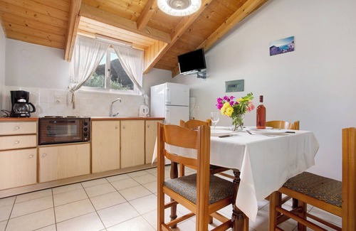 Limni Keri Apartment | Apartment "Dolphin Apartment Sea View 9" with Private Balcony, Shared Garden & Wi-Fi