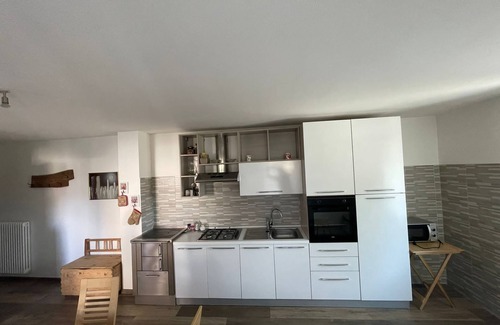 Revo Apartment | Apartment in the mountains, view of the Maddalene chain -Trentino-Alto Adige CIN