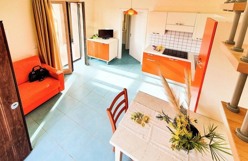 Cavo Apartment | Apartment 'La Pergola al Cavo 9' with Sea View, Shared Pool, Terrace & Wi-Fi