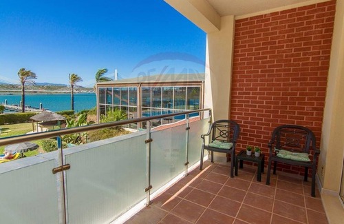 Mexilhoeira da Carregacao Apartment | apartment panoramic view of the pool, and the arade river Lagoa, Algarve