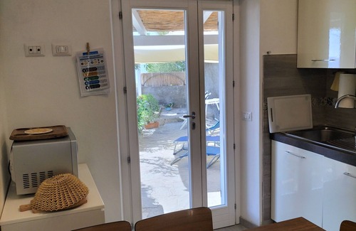 Pomonte Apartment | Apartment with exclusive garden and seaview in Pomonte, 50 meters from the sea