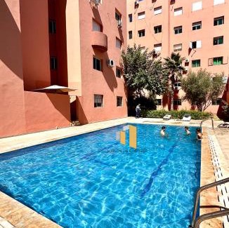 Gueliz Apartment | Appart F3 de luxe à Gueliz - 5 min de la gare - Piscine, WiFi, parking au coeur de Marrakech