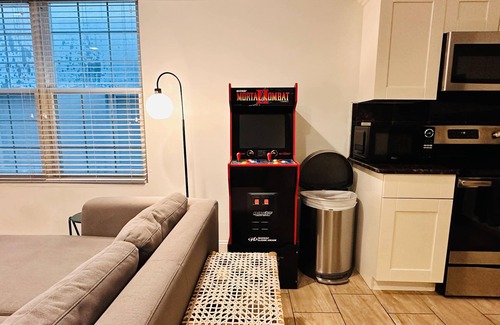 Chinatown Apartment | Arcade 2BR Apt in Walk-up w Laundry