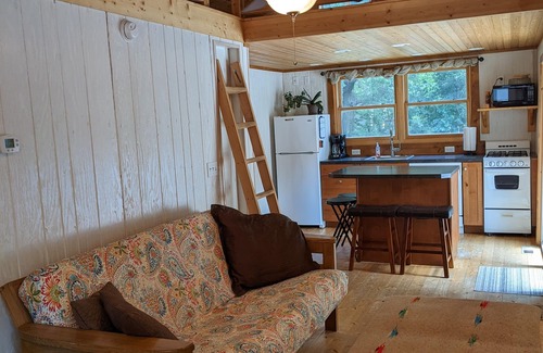 Arnolds Park Cabin | Arnolds Park Cabin with kayaks, bikes, and golf cart