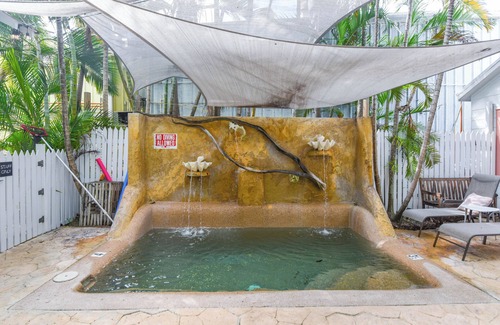 Historic Seaport Apartment | Atocha Cottage at Harbor Walk Hideaways | 2 Blocks From Duval! Shared Pool