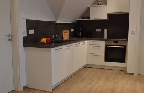 Memmelsdorf Apartment | Attractive studio apartment w. Balcony in Memmelsdorf/Bamberg and e-bike storage room