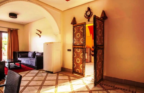 Tahanaout Villa | AUBERGE KENZA Villa farm hosting heated pool view of the Great Atlas
