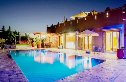 Tahanaout Villa | AUBERGE KENZA Villa farm hosting heated pool view of the Great Atlas
