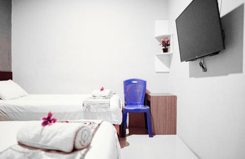 Darmo Hotel | Audah Syariah Residence Mitra RedDoorz