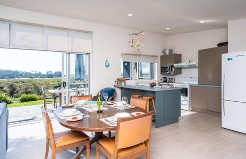 Mangawhai House | Back Bay Beauty - Sunny, pet-friendly kiwi bach with lovely estuary views and access