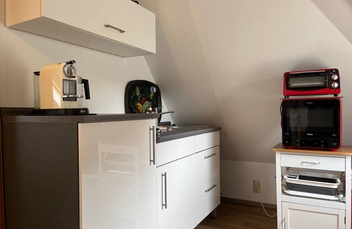 Biendorf Apartment | Baltic Sea vacation apartment 1-left/maisonette/upper floor with balcony - FeWo's am Gutshaus