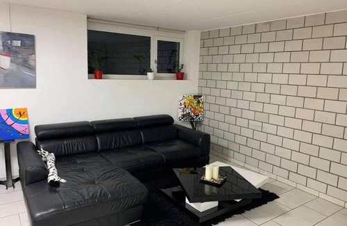 Muttenz Apartment | Basel - 5 mins away - Modern Basement Studio with Kitchen 35m2 in Muttenz
