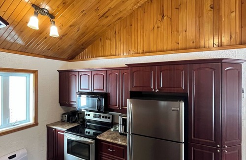 Grand-Remous Ski Chalet | Baskatong Pointe Cottage facing Baskatong Lake