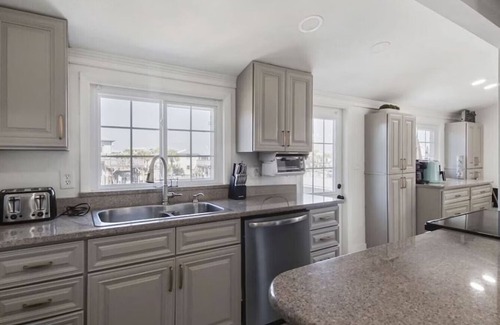 Holiday Isle House | Beach and Boat! Private pool, Boat Dock, Beach Access, Golf Cart included.