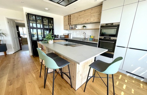 Southwick House | Beach House with huge deck & hot tub leading directly onto Shoreham Beach
