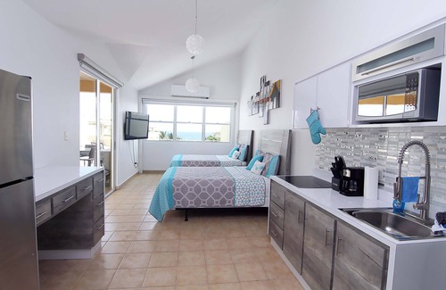 Jobos Apartment | Beachfront Modern Loft with Large Private Terrace