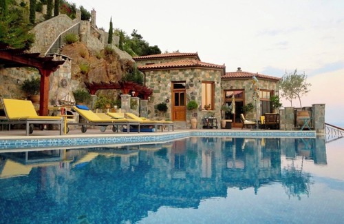 Loutra Edipsou House | Beachfront, Stone-Built, Beautifully-Appointed, Spacious 5-bedroom Villa.