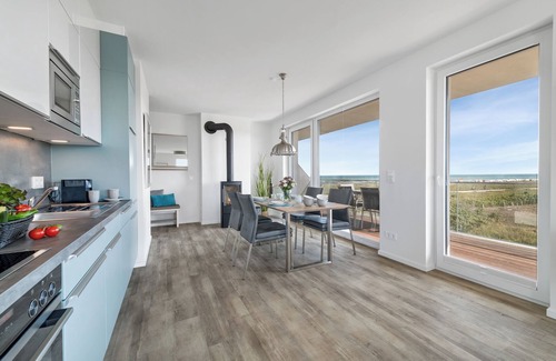 Olpenitz Apartment | "BeachLoungeOne" vacation apartment on the beach with sun terrace, sauna & sea view