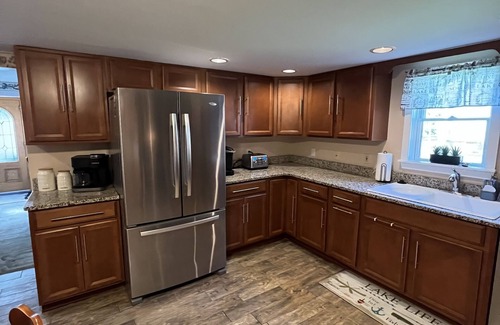 Pittsfield House | Beautiful 8 Bedroom, Walk to Lake, Jetted Hot Tub, Fireplace, & Pool Table