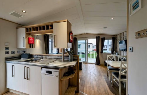 Hopton on Sea House | Beautiful 8 berth caravan with decking at Hopton Holiday Village ref 80016W
