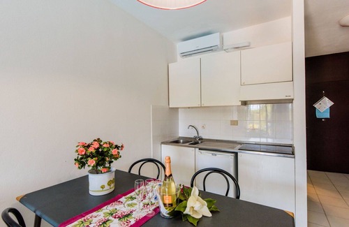 Marina di Bibbona Apartment | Beautiful apartment for 4 guests with pool, A/C, WIFI, TV, terrace, pets allowed and parking