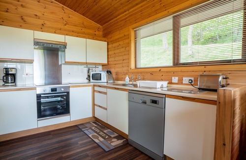 Drumnadrochit House | Beautiful apartment in villa for 6 guests with WIFI, TV, patio, panoramic view and parking