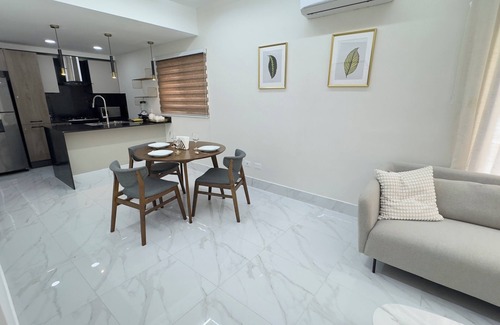 Yolanda Morales Apartment | Beautiful Apt in Piantini Rooftop Views, Gym & Central