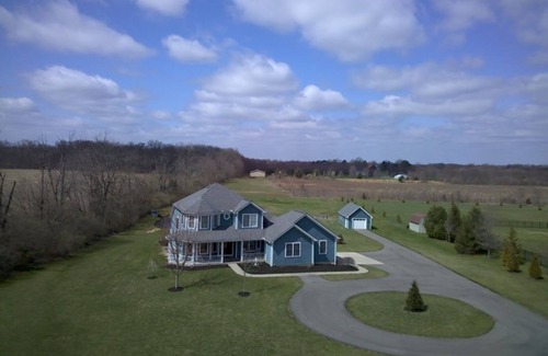 Oregonia House | Beautiful Big Blue Dollhouse country home available for true comfort.