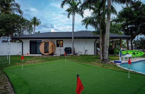 Garden Isles House | Beautiful Canalfront W/Heated Pool, Games & Sauna!