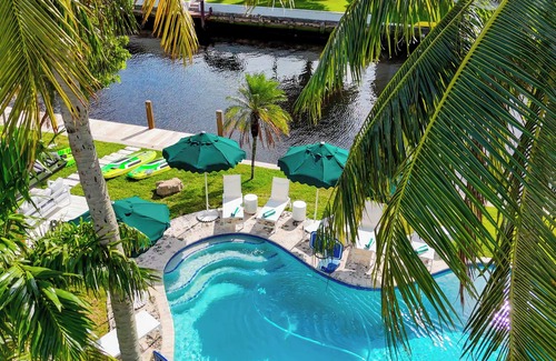 Garden Isles House | Beautiful Canalfront W/Heated Pool, Games & Sauna!
