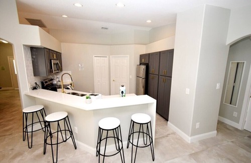 Greater Groves House | Beautiful Family Home near Disney! Completely Renovated! Private Pool & Jacuzzi!