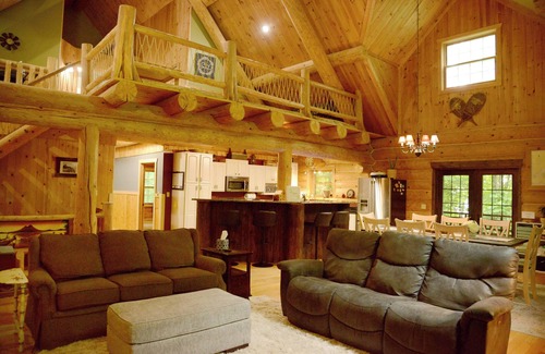 Brimley Cabin | Beautiful log cabin in the woods with a hot tub. 5 min walk to a quiet beach.