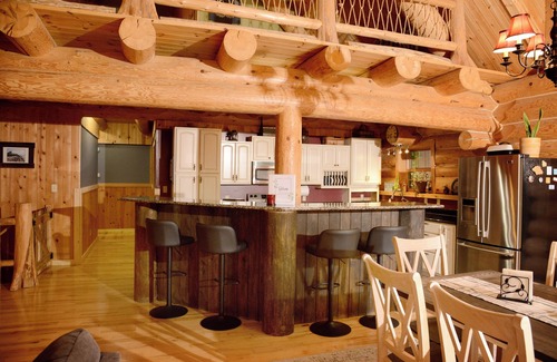 Brimley Cabin | Beautiful log cabin in the woods with a hot tub. 5 min walk to a quiet beach.