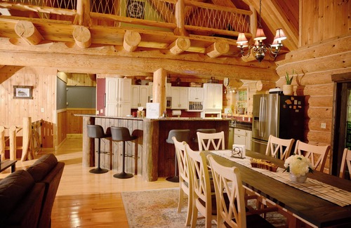 Brimley Cabin | Beautiful log cabin in the woods with a hot tub. 5 min walk to a quiet beach.