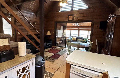Okeechobee Cabin | Beautiful private log cabin on the water in a small cabin community.