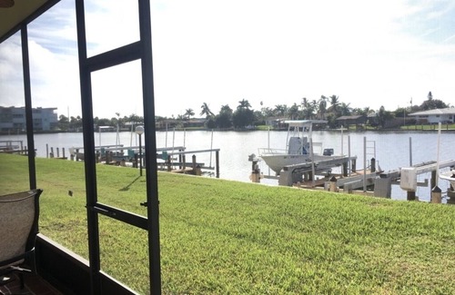 Cocoa Isles Condo | Beautiful sunsets from this ground floor Waterfront Condo - 3 month minimum