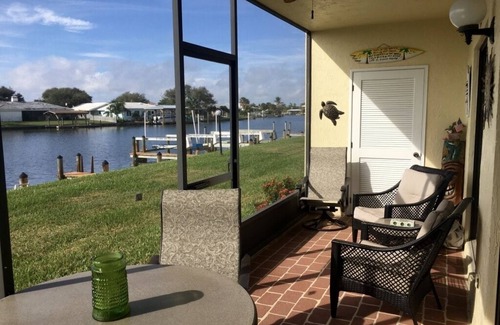 Cocoa Isles Condo | Beautiful sunsets from this ground floor Waterfront Condo - 3 month minimum