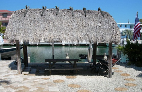 Venetian Shores Villa | Beautiful Venetian Shores, Cozy home, Heated pool, Tiki, Boat Lift, Fish & Dive.