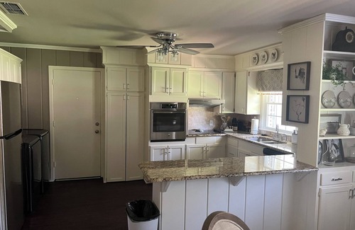 Tyler House | Beautifully updated 3bedroom 2 bath home with a large glassed in sunroom.