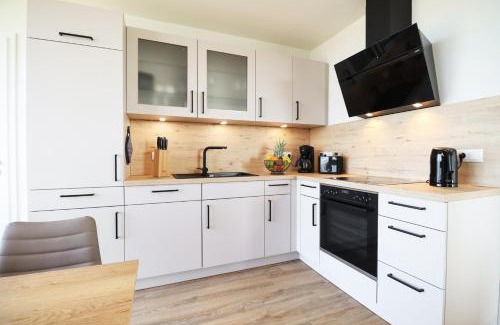Marienleuchte Apartment | BeltBlick 11 – Ferienwohnung mit unverbautem Meerblick & Dachterrasse!